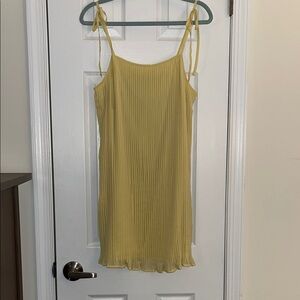 Yellow pleated mini dress